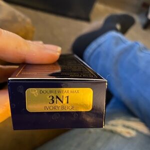 Estée Lauder Double Wear Max foundation in color 3N1 ivory beige.